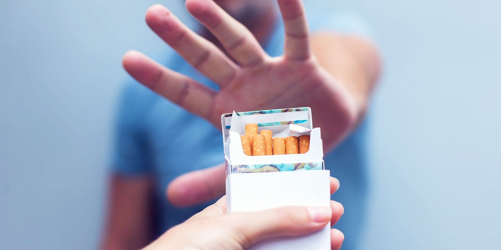 bigstock-man-refusing-a-cigarette-from-242727175