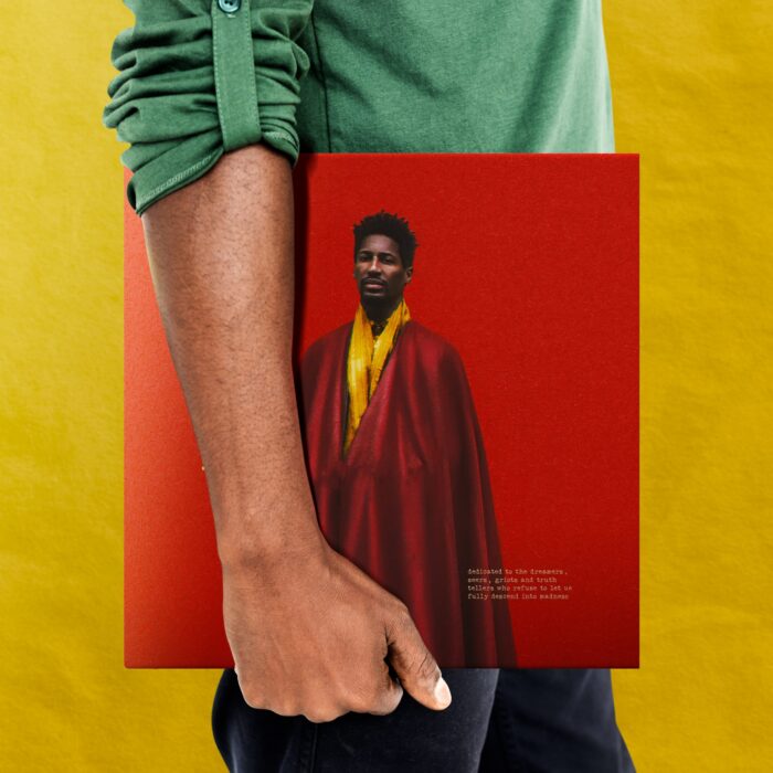 African Man Holding Record Concept Jon Batiste y FREEDOM