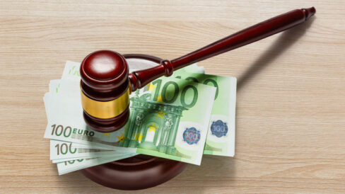 Judge’s gavel and one hundred euro banknotes