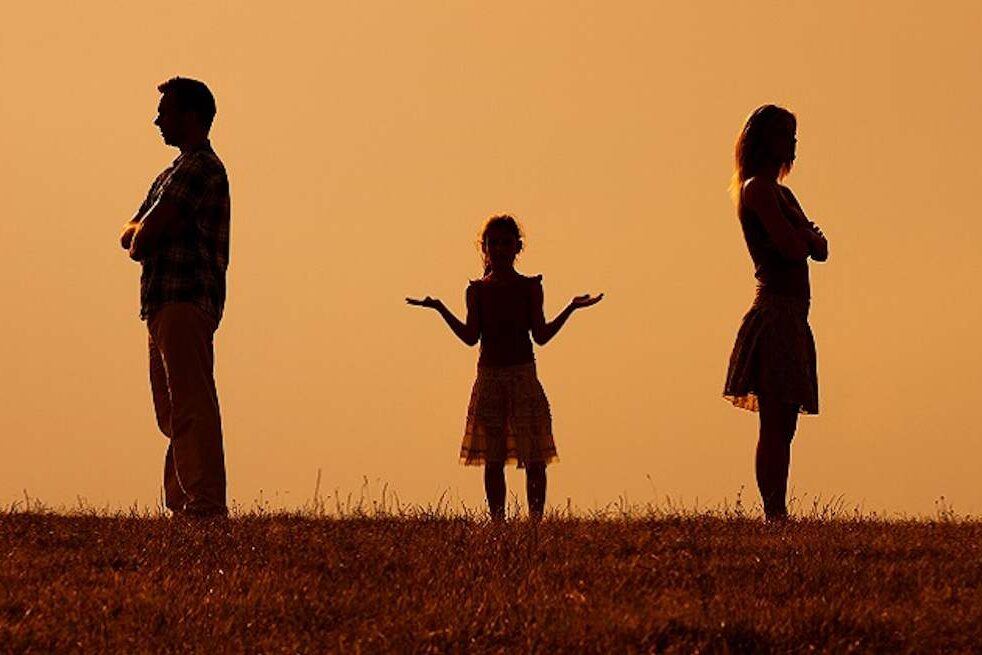 Pareja divorciada con hija Istock
